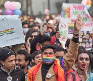 A photo showing members and supporters of LGBTQAI+ community holding placards as they take part in Delhi's Queer Pride Parade from Barakhamba Raod to Jantar Mantar, in New Delhi.