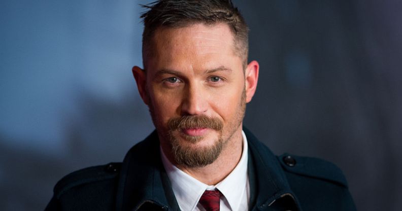 Tom Hardy has been spotted wearing rainbow Pride Crocs and the internet is obsessed.