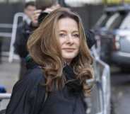 A photo shows education secretary Gillian Keegan wearing a black coat as she leaves Downing Street
