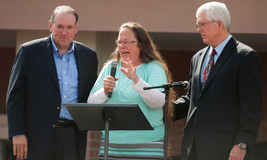 Mat Caver with Kim Davis and Mike Huckabee in 2015.