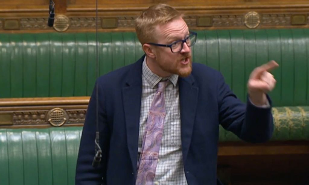 Labour MP Lloyd Russell-Moyle wears a suit and tie as he gestures off screen towards Miriam Cates who addressed the House of Commons after the UK government blocked Scotland's Gender Recognition Reform bill from passing into law