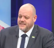 Mark Jenkinson, a Tory MP, speaking during an appearance on GB News. He is pictured wearing a grey suit and a navy tie with a white shirt.