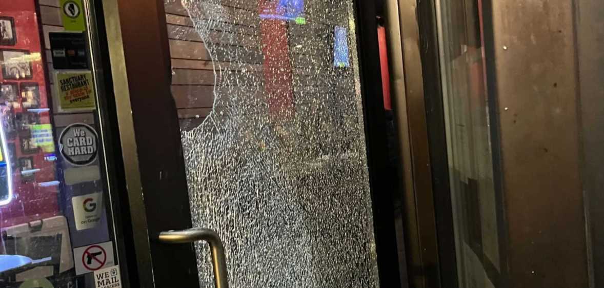 A photo from Chicago's R Public House shows the front door that was shattered during an alleged homophobic incident