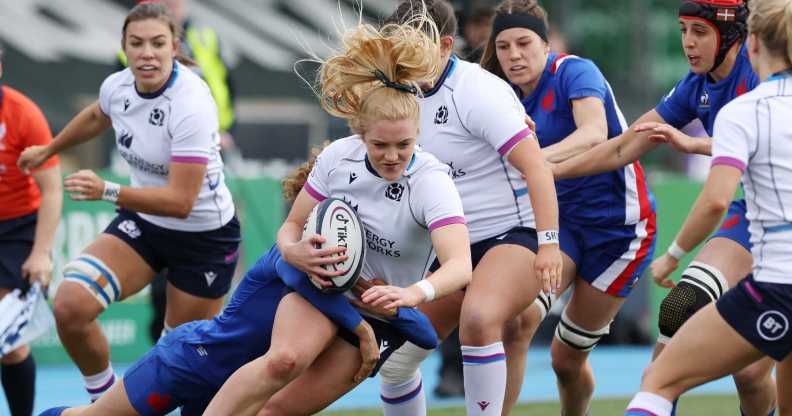 Megan Gaffney of Scotland is tackled by Marie-Aurelie Castel of France during the Scotland and France Women's Six Nations matc at Scotstoun Stadium on April 10, 2022 in Glasgow, Scotland.