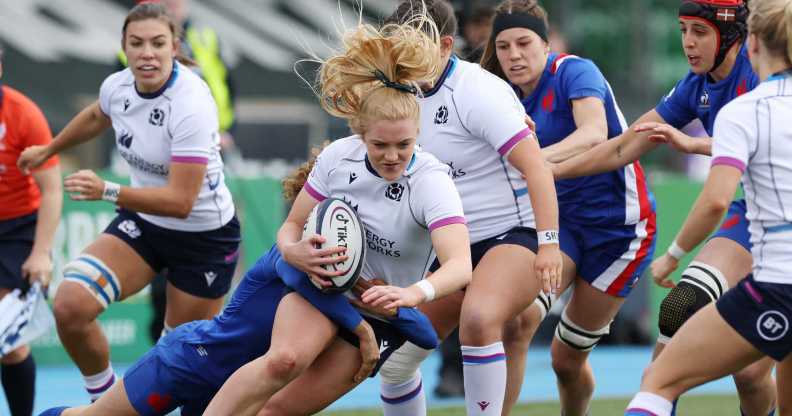 Megan Gaffney of Scotland is tackled by Marie-Aurelie Castel of France during the Scotland and France Women's Six Nations matc at Scotstoun Stadium on April 10, 2022 in Glasgow, Scotland.