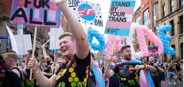 A group of trans activists celebrate during a Pride festival