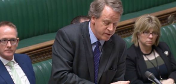 Scotland secretary Alister Jack wears a dark suit and tie while taking questions on why the UK government is blocking Scotland's Gender Recognition Reform bill from becoming law