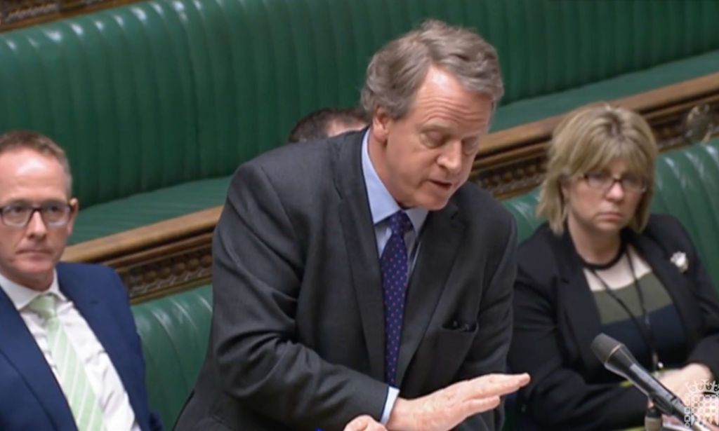 Scotland secretary Alister Jack wears a dark suit and tie while taking questions on why the UK government is blocking Scotland's Gender Recognition Reform bill from becoming law