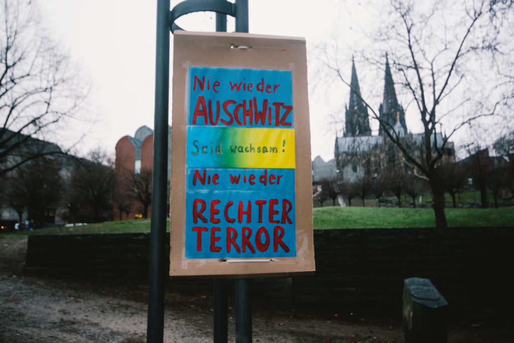 No more Auschwitz, no more right terrorists sign is seen near the memorial of gay and lesbian victims during the Holocaust on the International Holocaust Memorial Day. 