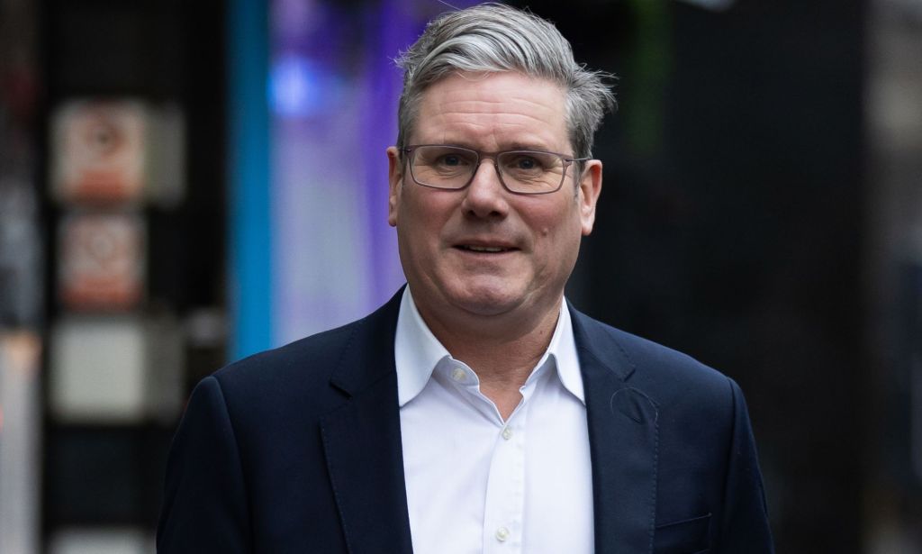 Labour leader Keir Starmer wears a white shirt and dark blue jacket. He has faced criticism for saying he has 'conserns' over Scotland's gender reform bill