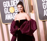 Selena Gomez wears and burgundy dress at the Golden Globe Awards