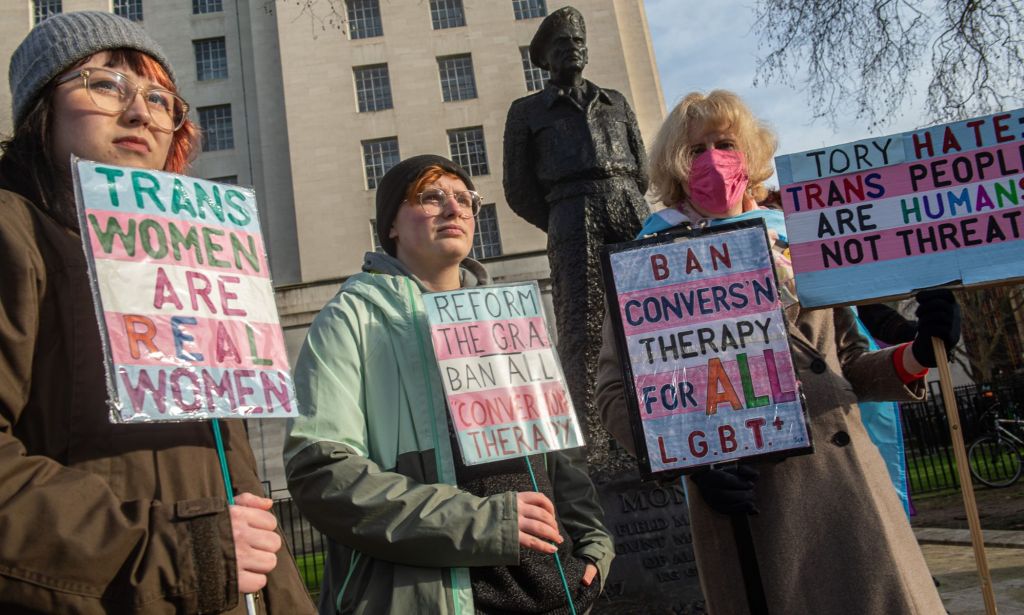 Trans rights activists protest opposite Downing Street after the UK government announced it will use a Section 35 order to block Scotland's recent Gender Recognition Reform Bill