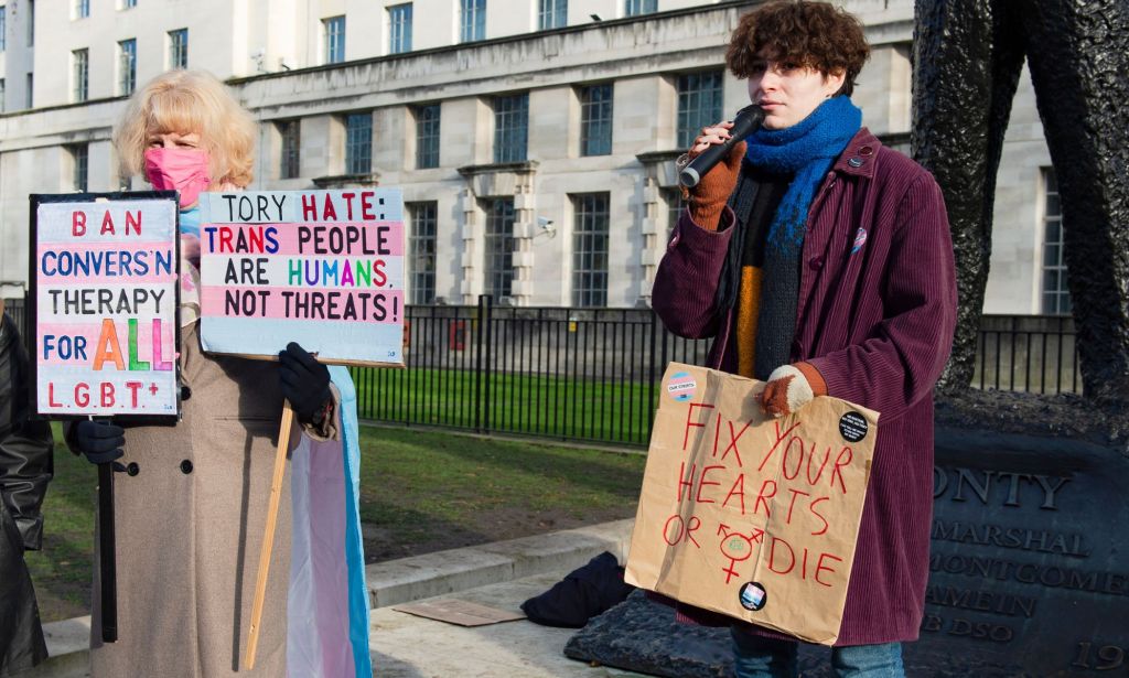 Trans rights activists protest opposite Downing Street after the UK government announced it will use a Section 35 order to block Scotland's recent Gender Recognition Reform Bill 