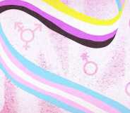 Illustration of a ribbon with the trans Pride flag stripes on one side, and the non-binary colours on the other