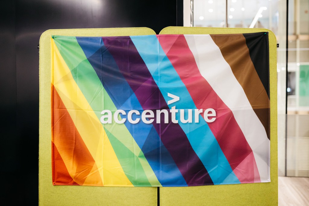 A Progress Pride Flag with the Accenture logo