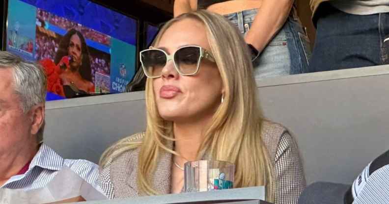 Adele waiting for Rihanna to perform at 2023 Super Bowl.