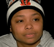 Ayanna McKinney in a grey hoodie and woolly hat