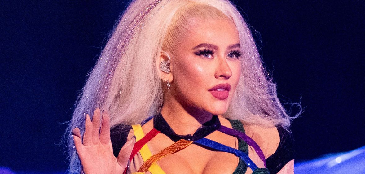 Christina Aguilera performing in a strappy rainbow top at LA pride.