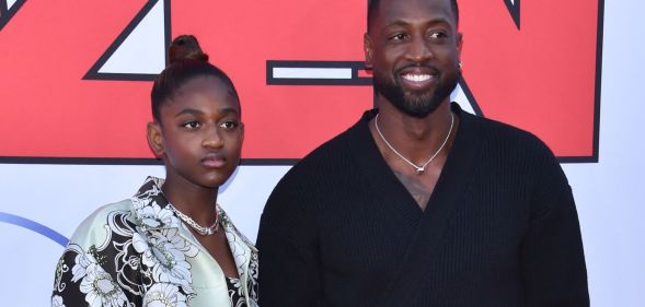 Zaya and Dwyane Wade at a red carpet event.