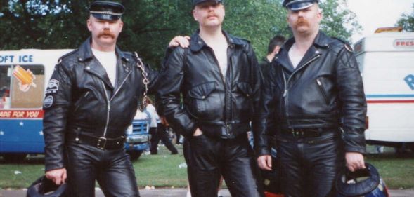 Stuart Conroy (died 20 August 1992), Tomas Jerkestad (died spring 1994), and Steve Craftman, who is still alive today, pictured at a Pride event in 1989. The three men are dressed in leather.