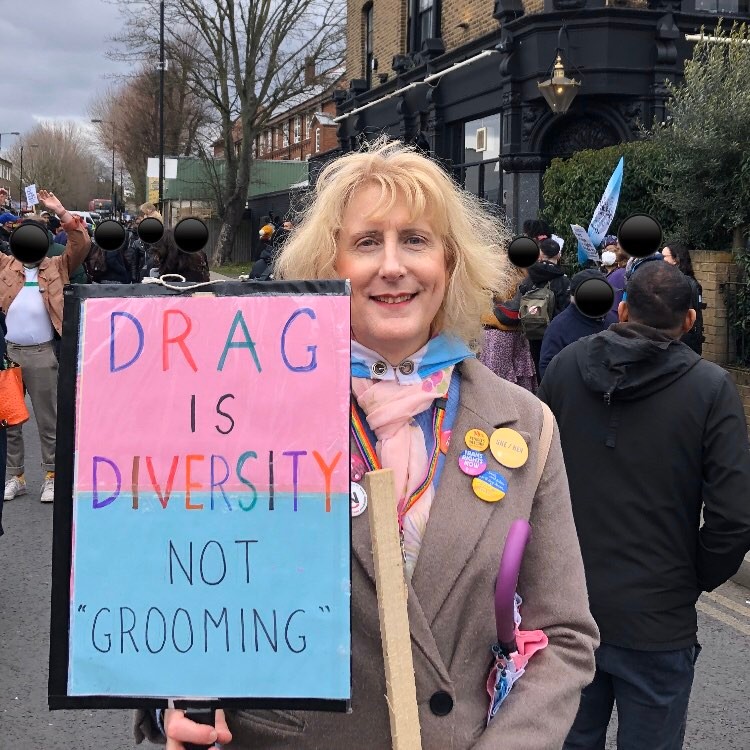 Jennifer Dean holds a sign reading 'Drag is diversity, not "grooming"' during a counter-protest outside The Honour Oak Pub in south-east London