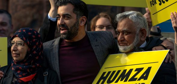 Humza Yousaf, hugging his parents, during a leadership rally.