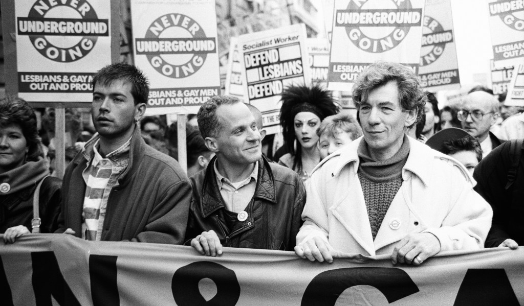 Ian McKellen (right) and Michael Cashman (centre) protesting against Section 28 in Manchester in 1988