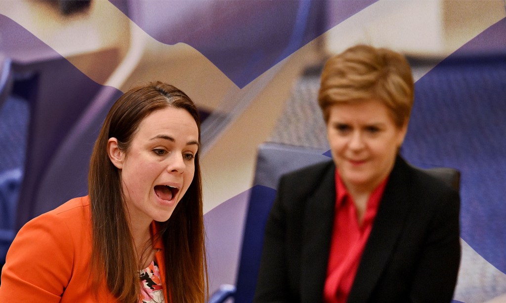 Kate Forbes pictured with Nicola Sturgeon in the background. The background of the image has been edited so the pair are pictured against a Scottish flag.