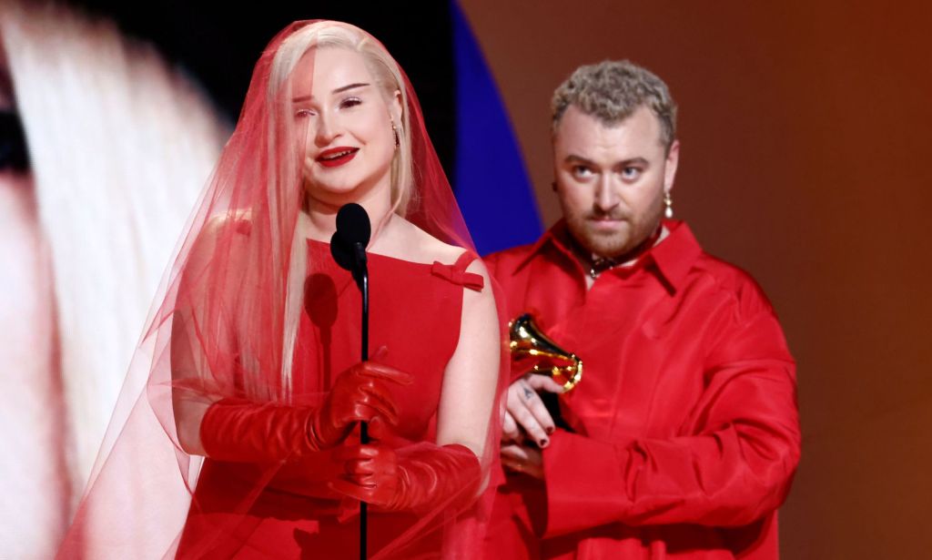 Kim Petras and Sam Smith wear co-ordinating red outfits to collect their Grammy award at the 2023 Grammys.