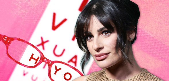 Lea Michele poses in front of a background showing reading glasses and an eye test exam