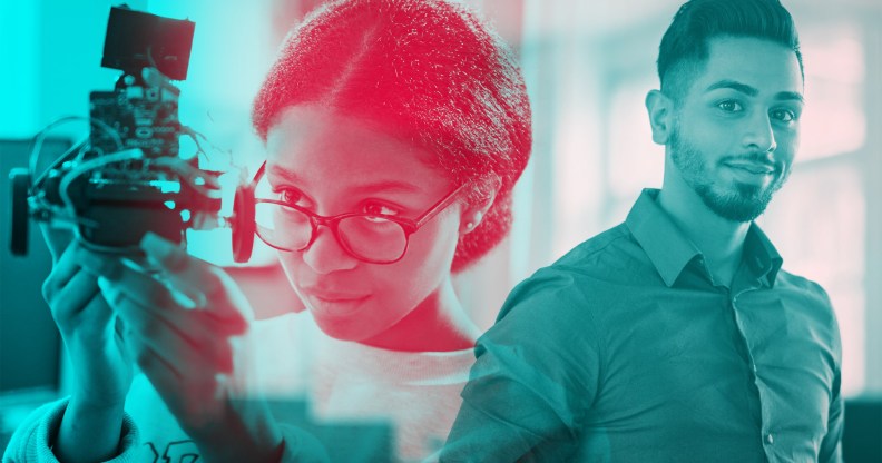 A woman is inspecting a piece of machinery. Next to her is a man looking at the camera.