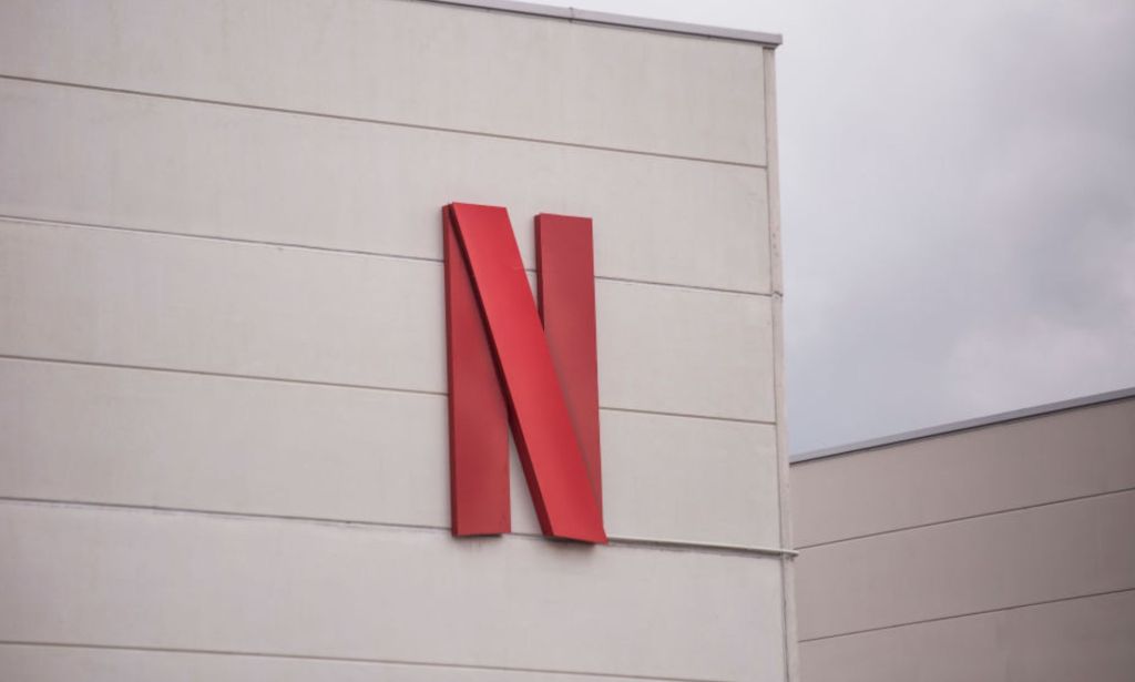 This is an image of a building. There is a rex X in the center. It is the logo of Netflix