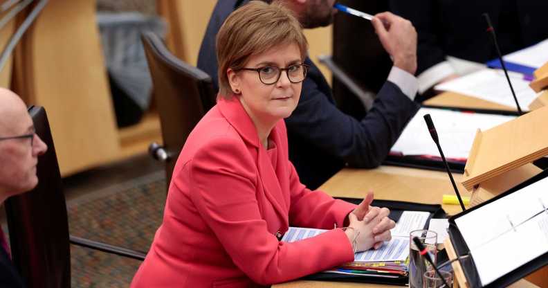 Nicola Sturgeon in a pink suit