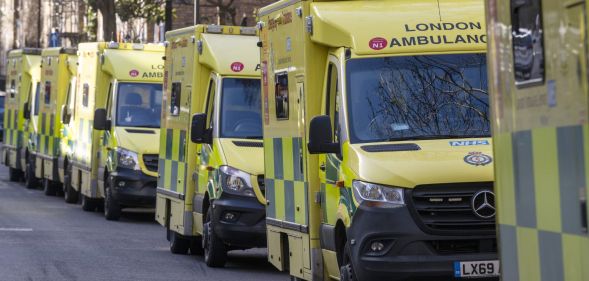 Several ambulances driving through London.