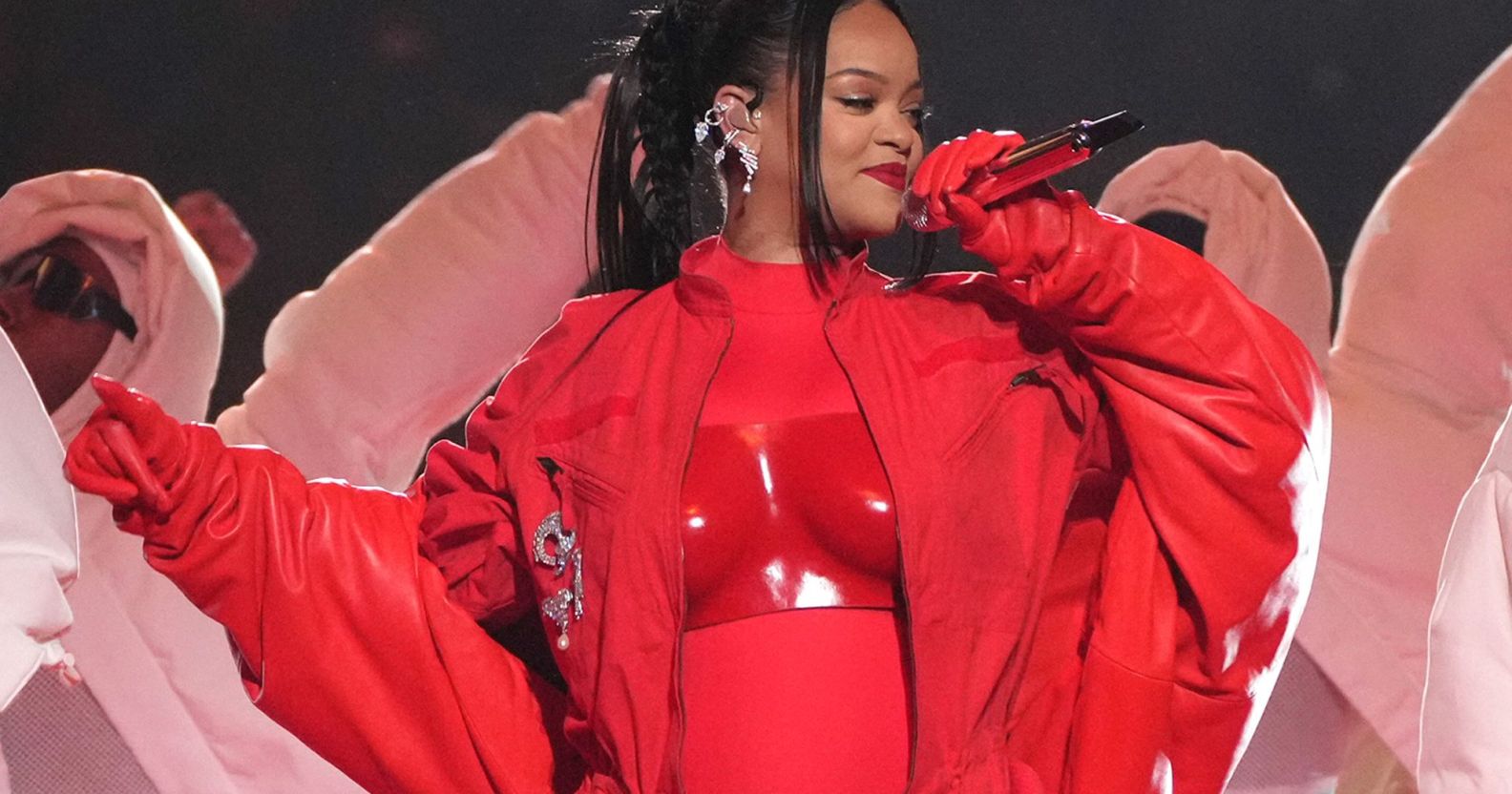 Rihanna in a full red outfit duruing the Super Bowl halftime show.