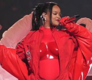 Rihanna in a full red outfit duruing the Super Bowl halftime show.