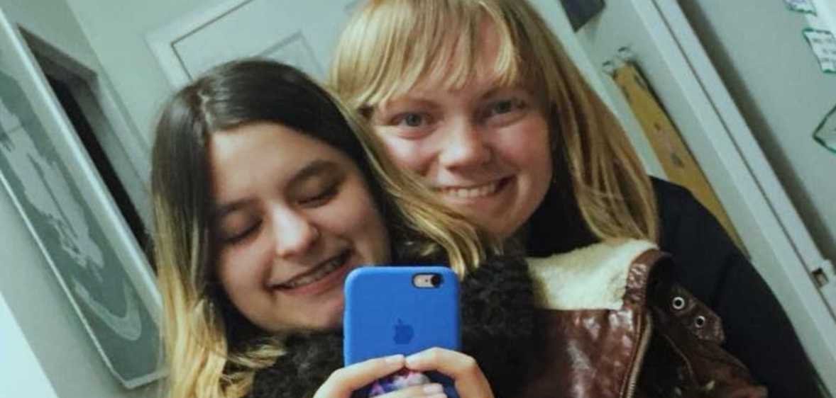A photo of Ontario couple Tatiana and Katie smiling as they pose for a selfie