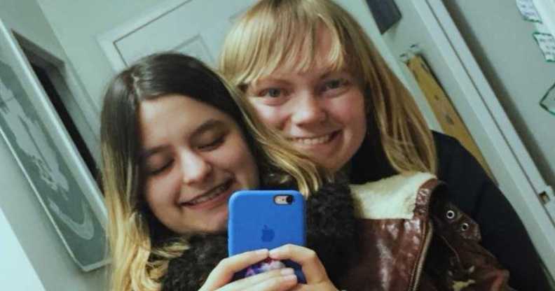 A photo of Ontario couple Tatiana and Katie smiling as they pose for a selfie
