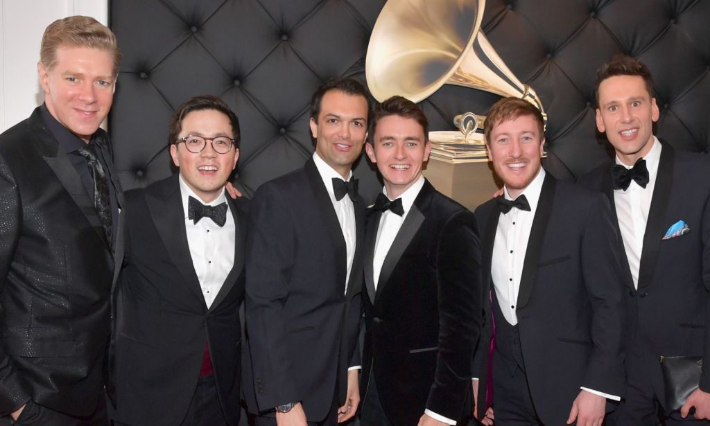 The Kings Singers wearing full black suits complete with black ties at red carpet appearance at the 2019 Grammy Awards.