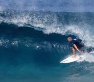 A surfer riding a wave