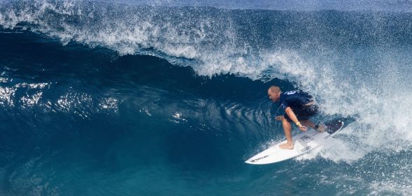A surfer riding a wave