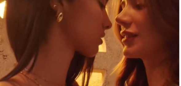 Still from the Fenty Beauty advert showing two women about to kiss