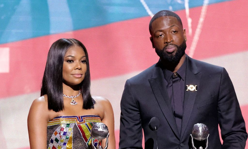 A graphic of Gabrielle Union and Dwyane Wade with a trans Pride flag in the background as they honour their trans child, Zaya, and the LGBTQ+ community during their NAACP Image Awards speech