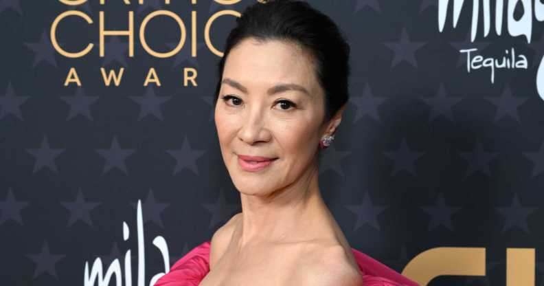 Photo of Actor Michelle Yeoh posing for the cameras at the Critics Choice Awards ceremony