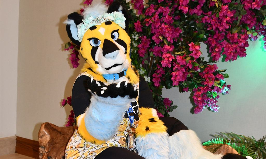 Reskell, an LGBTQ+ furry, poses for a photograph during a convention