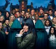 Claudia and the cast of the The Traitors standing outside of a castle