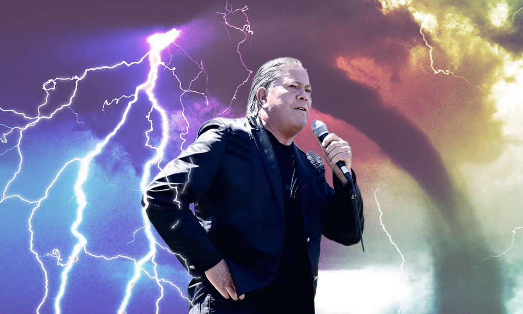 New Zealand church leader Brian Tamaki stands in front of a stormy background