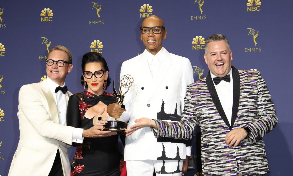 Carson Kressley, Michelle Visage, RuPail and Ross Matthews hold their Emmy.