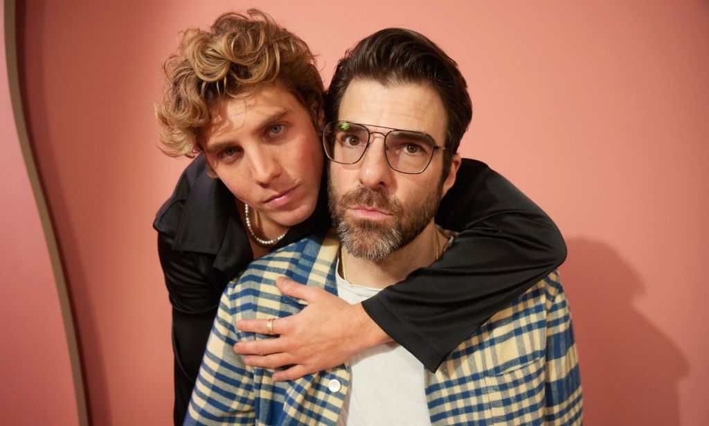 Lukas Gage puts his arm around Zachary Quinto while posing at the SXSW film festival.