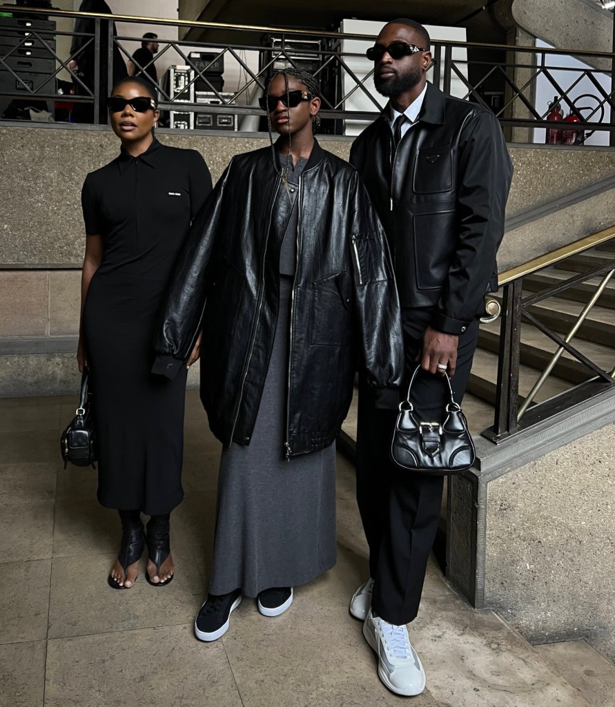 Gabrielle Union (L), Zaya Wade and Dwayne Wade at Paris Fashion Week